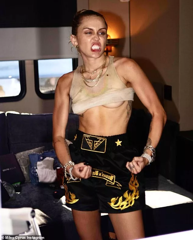 Miley Cyrus Showcases Toned Physique And Celebrates Success Of Charlies Angels Song